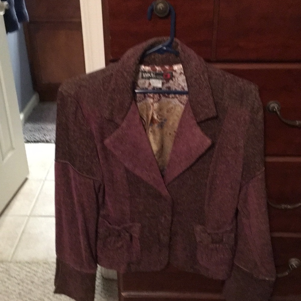 Blazer labeled large, more like a medium